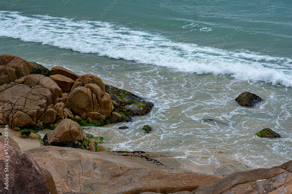 waves crashing on rocks in Florianópolis waves crashing on rocks in Florianópolis