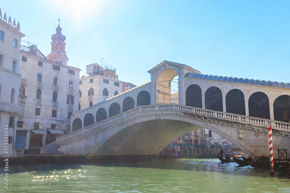 Rialto Bridge through Grand Canal in Venice, Italy