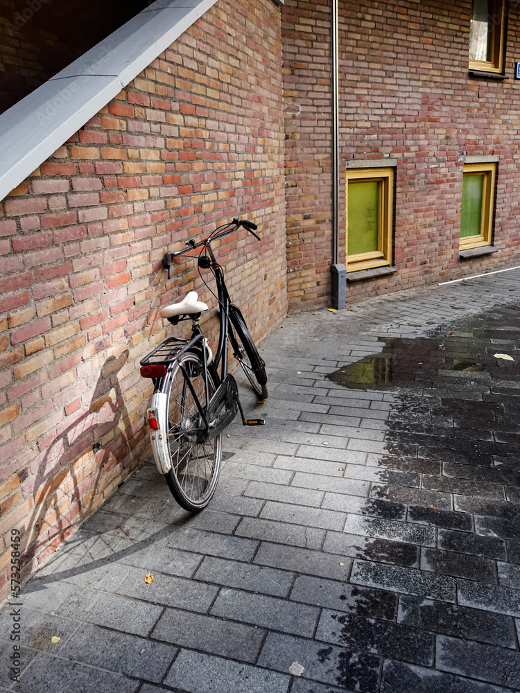 bicycle in front of a wall