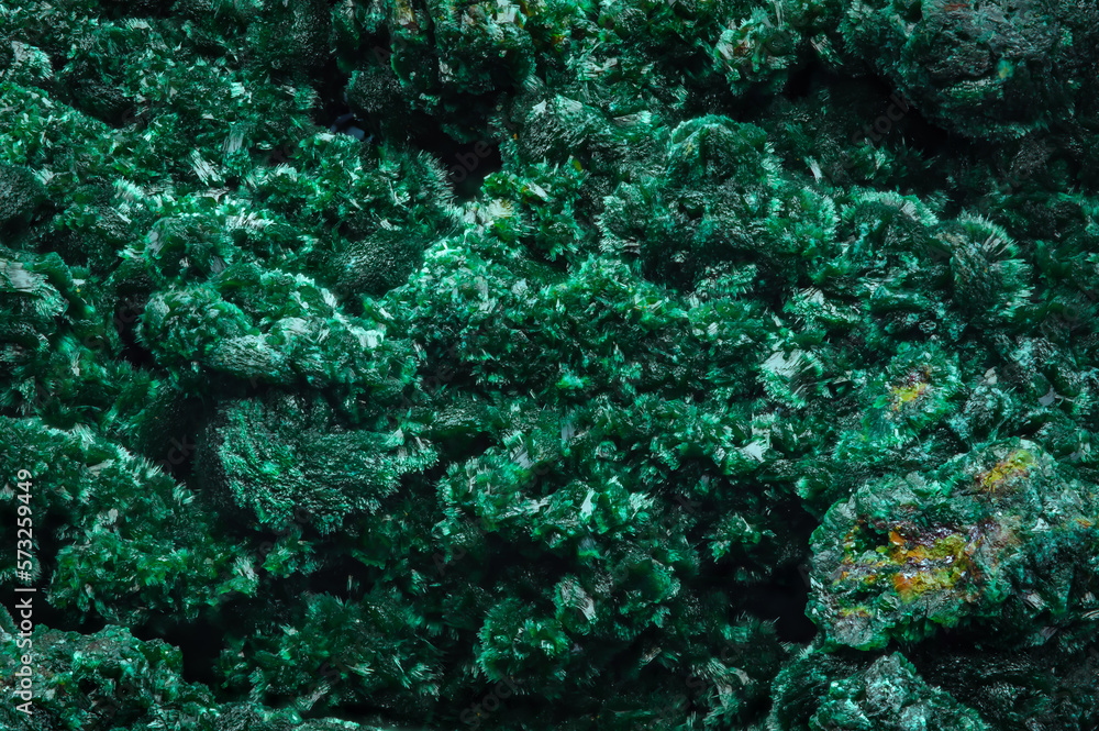 Fototapeta premium Malachite green macro detail texture background. close-up raw rough unpolished semi-precious gemstone