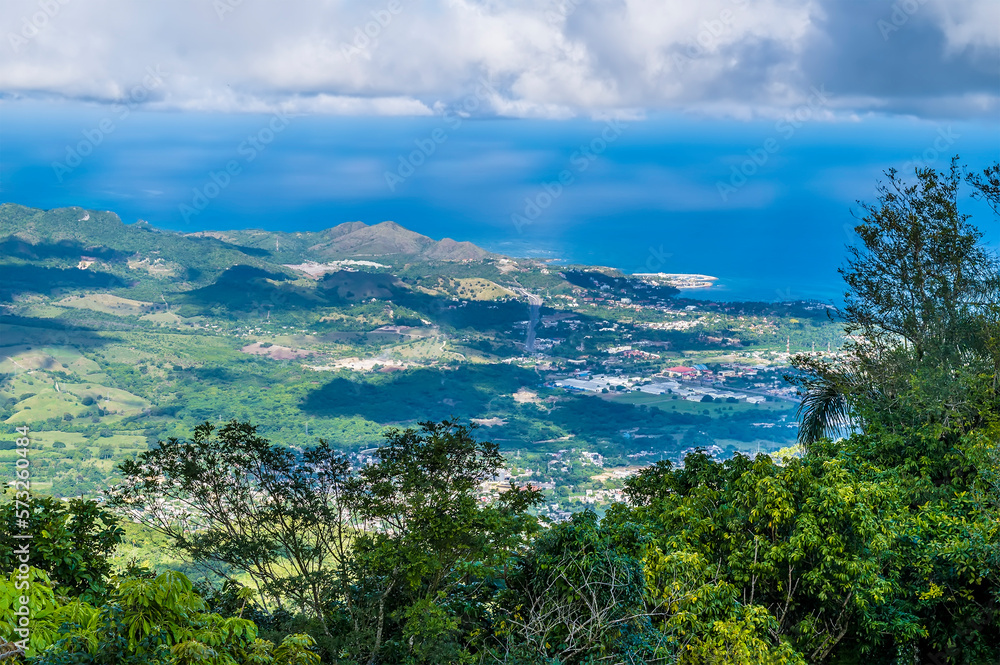 A view down towards Puerto Plata from the footbridge at the summit of Mount Isabella in the Dominion Republic on a bright sunny day