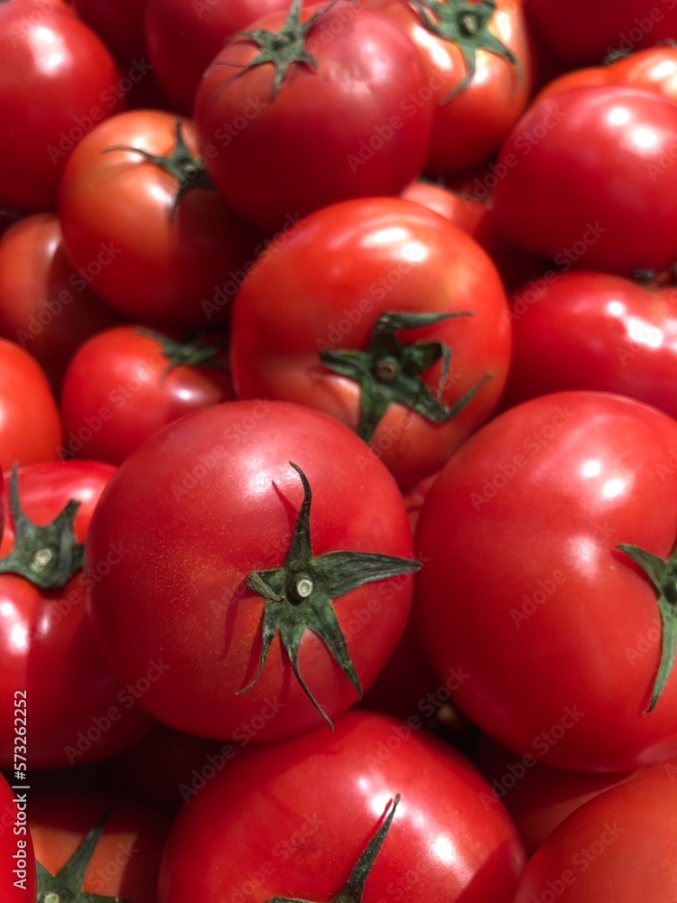 delicious ripe red tomatoes at the farmer's market. delicious ripe red tomatoes at the farmer's market.