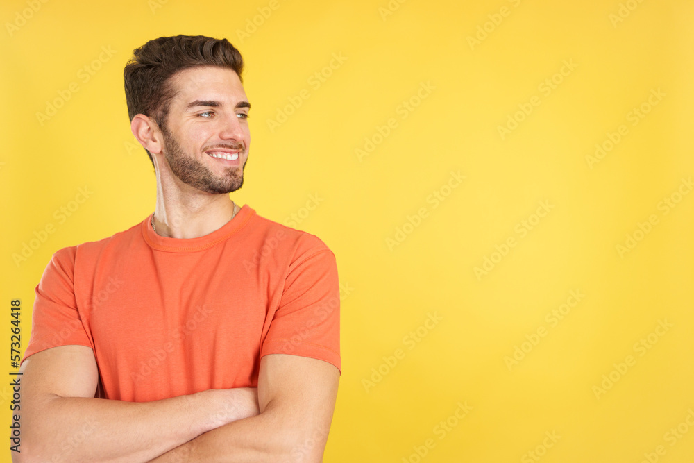 Caucasian man smiling while looking to the side Caucasian man smiling while looking to the side
