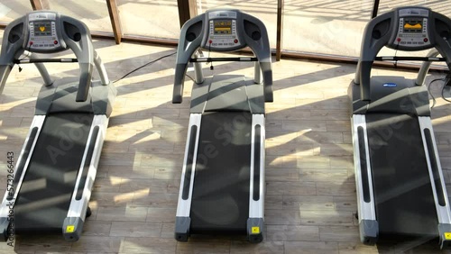 Wallpaper Mural Treadmills in the gym. Cardio workout for weight loss. Running for endurance. Doing sports on the equipment in the hall Torontodigital.ca