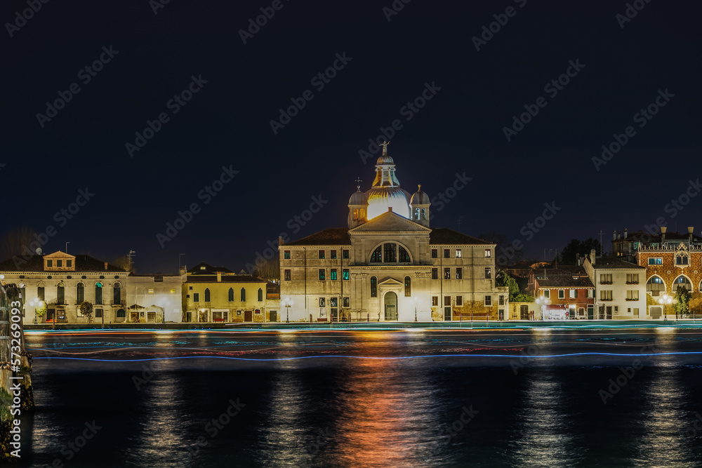 Venice Italy night view of Giudecca island with illuminated Le Zitelle Roman Catholic church, Santa Maria della Presentazione. Venice Italy night view of Giudecca island with illuminated Le Zitelle Roman Catholic church, Santa Maria della Presentazione.