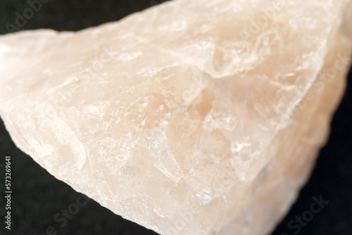 Rose quartz, stone silicate mineral. Rough, uncut, pinkish color. Close up macro