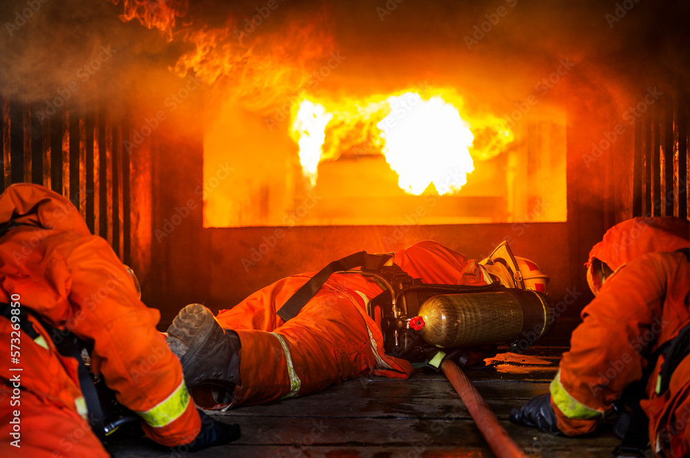 Fototapeta premium Fire fighter team work in training room