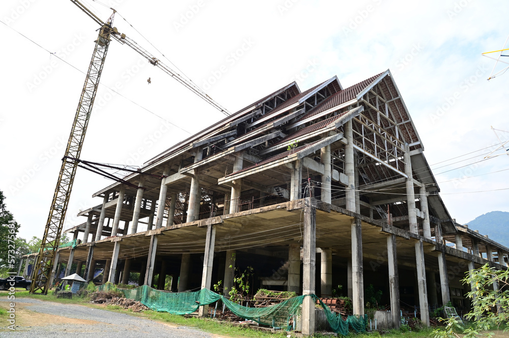 CHANTHABURI, THAILAND - FEBRUARY 19, 2023 : The Pavilion of Thai Buddhist temple Construction has not been completed abandoned for a long time with natural background.
