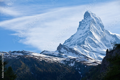 Matterhorn at day time.  The Matterhorn is a mountain of the Alps  straddling the main watershed and border between Switzerland and Italy.