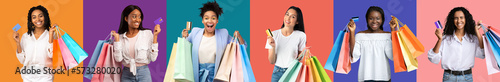 Smiling excited diverse young women with many bags with purchases show credit card, enjoy shopping
