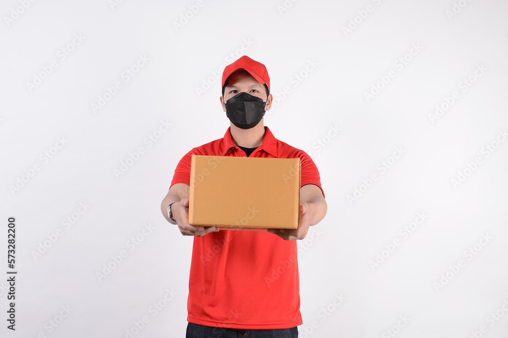Delivery man employee in red cap blank t-shirt uniform Delivery man employee in red cap blank t-shirt uniform