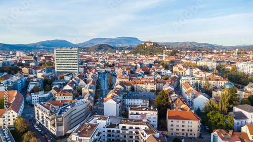 Aerial view of the Gries district in Graz, Austria. A high office building surrounded by lower houses as an architectural eyesore