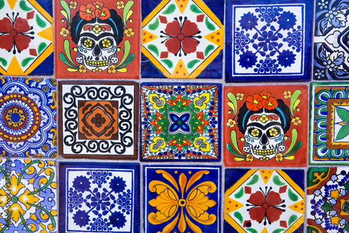 Colorful, patterned ceramic tiles on a wall in Cabo San Lucas, Mexico
