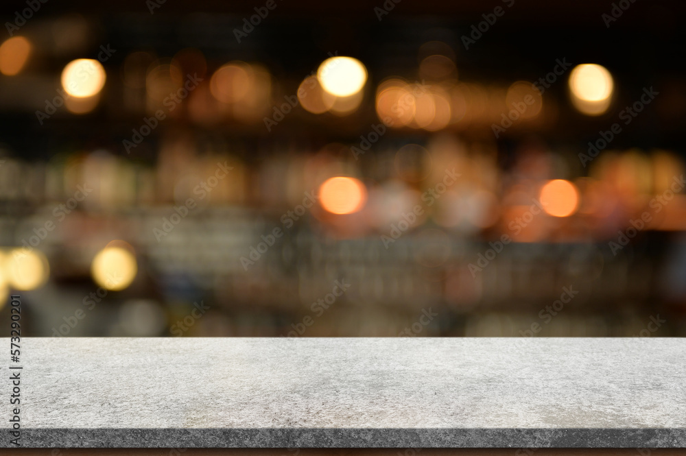 Empty white marble stone table top and blur interior cafe and restaurant.	
