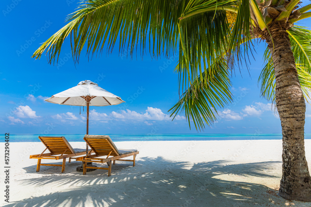 Amazing beach. Chairs on the sandy beach sea. Luxury summer holiday and vacation resort hotel for tourism. Inspirational tropical landscape. Tranquil scenery, relax beach, beautiful landscape design