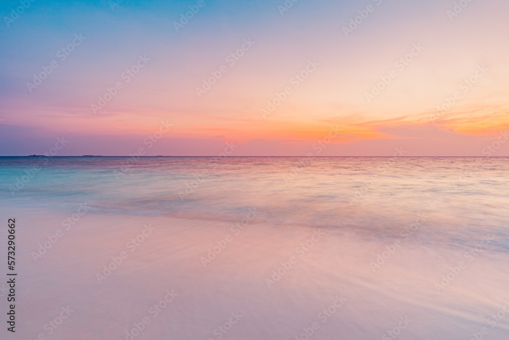 Closeup sea sand beach. Long exposure beach landscape. Inspire tropical beach seascape horizon. Dream colorful sunset sky. Calming tranquil meditation sunlight. Beautiful orange coast wave water