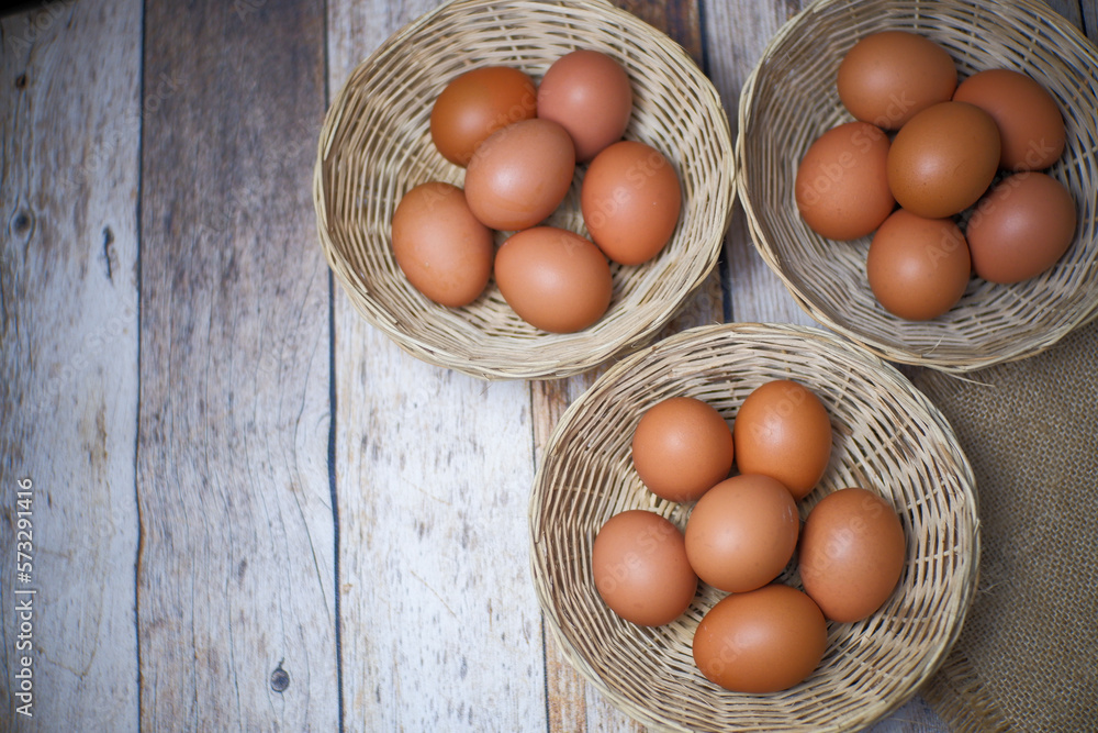 Eggs in three wicker baskets Eggs in three wicker baskets