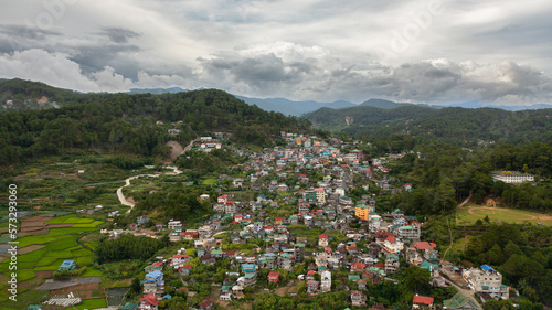 Town of Sagada in the valley among the mountains covered with forest. Philippines.