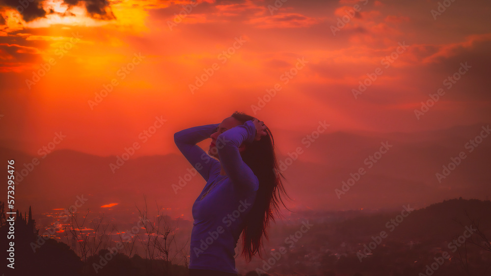 Fototapeta premium backlit silhouette of a woman