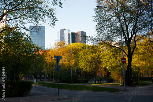 Skyscrapers and park in the center of Tallinn in warm sunlight