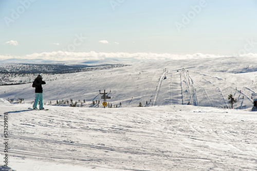 Unrecognizable woman seen from her back at Saariselka ski slopes