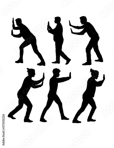 Male people pushing pose silhouette