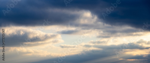 Fototapeta Naklejka Na Ścianę i Meble -  Dark clouds in the blue sky during sunset