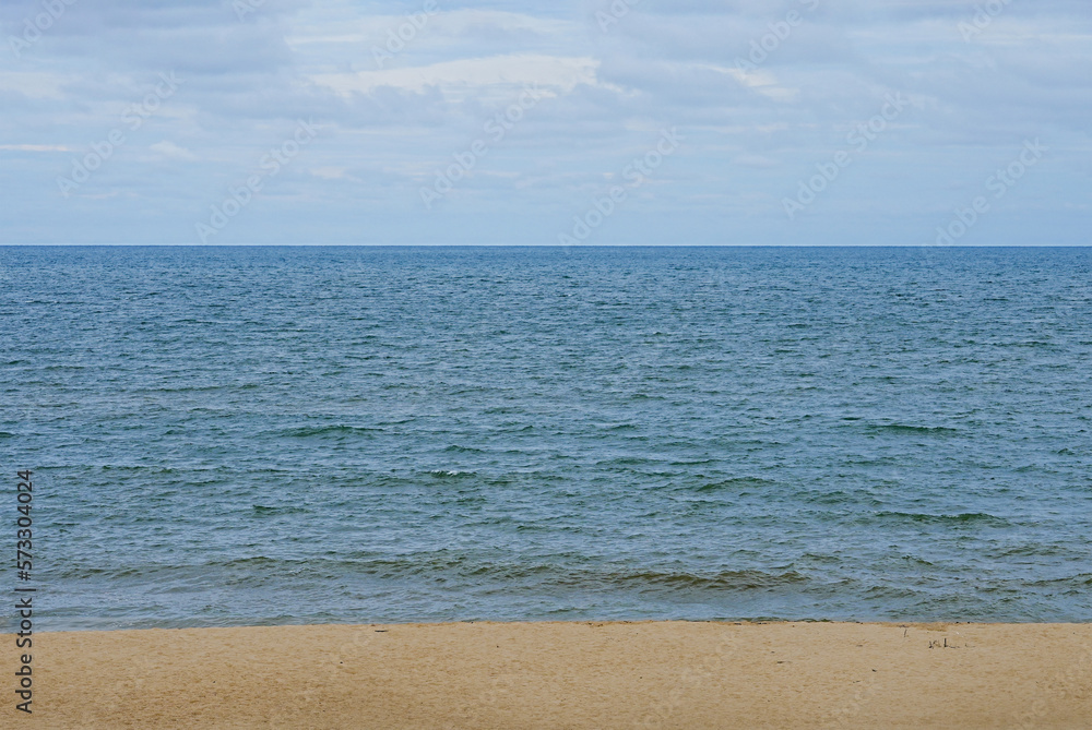 Sand beach with Summer Sky. Panoramic Seaside with Ocean wave landscape. Tropical beach and seascape with Blue Sky and soft sand, with calmness, tranquil relaxing day in South of Thailand Sand beach with Summer Sky. Panoramic Seaside with Ocean wave landscape. Tropical beach and seascape with Blue Sky and soft sand, with calmness, tranquil relaxing day in South of Thailand