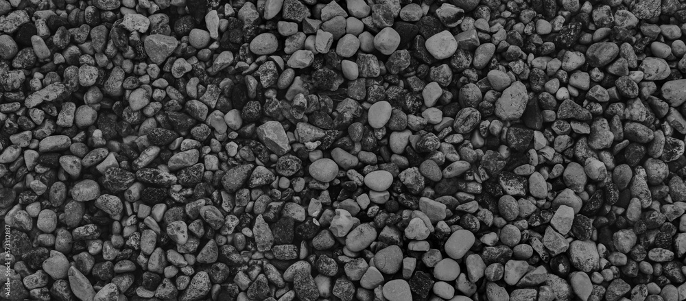 Black and white background from the texture of stones. Pebble banner Black and white background from the texture of stones. Pebble banner