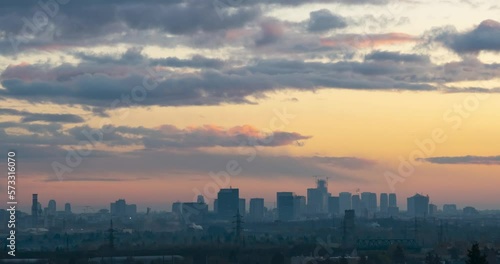 Wallpaper Mural Cityscape sunset time lapse. The silhouettes of skyscrapers and urban buildings against the background of clouds. City modern intensive life. Torontodigital.ca