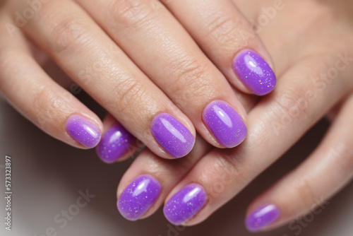 Female hands with nail design close-up. Beautiful female nails. 