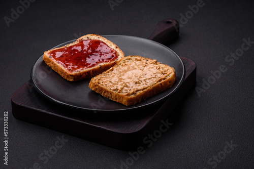 Nutritious sandwiches consisting of bread, raspberry jam and peanut butter