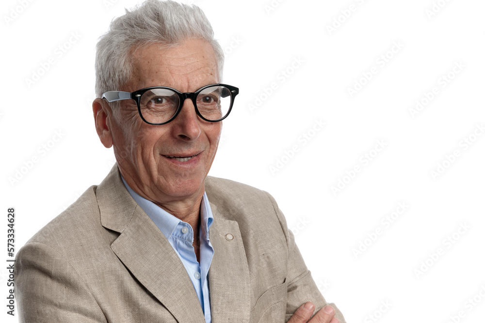 handsome guy in his 60s with white hair wearing glasses and looking away handsome guy in his 60s with white hair wearing glasses and looking away