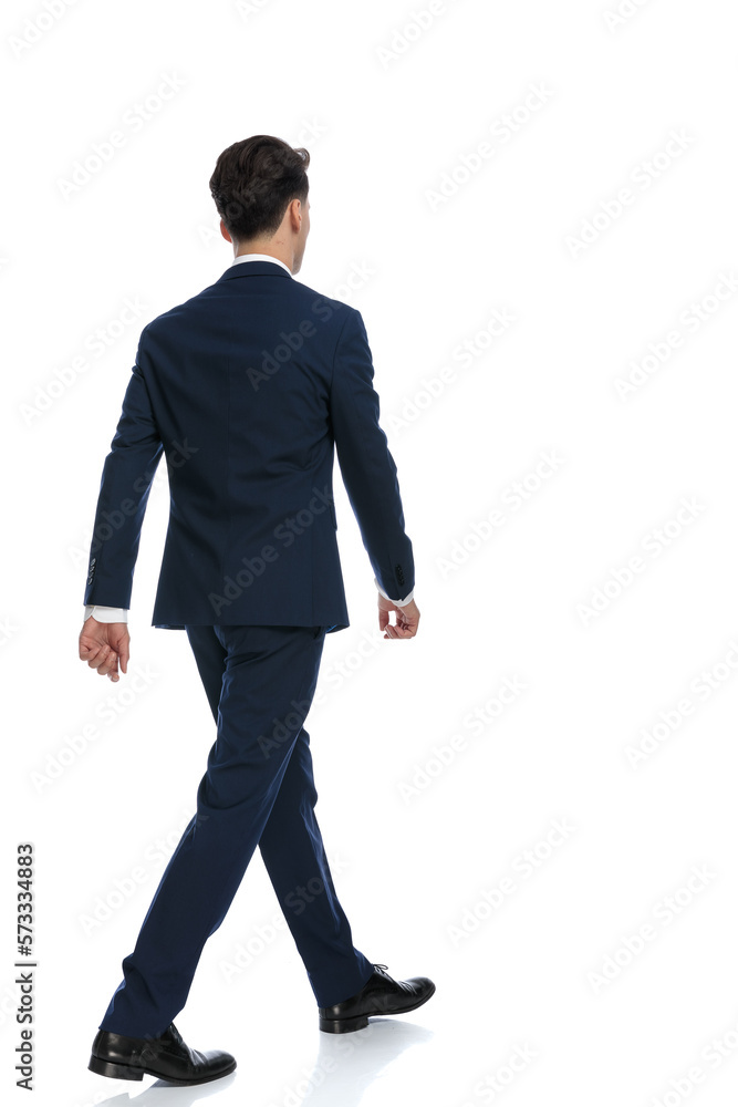 businessman walking on his own path businessman walking on his own path