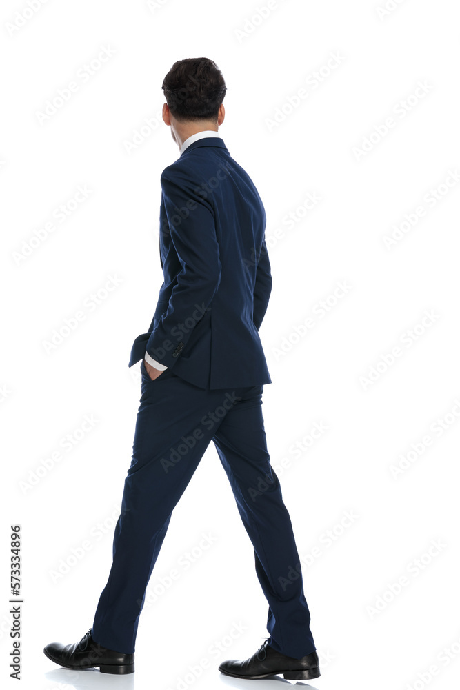 businessman walking and being distracted by something businessman walking and being distracted by something