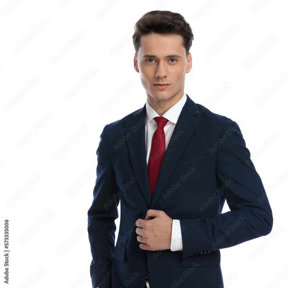 businessman arranging his jacket with elegance businessman arranging his jacket with elegance