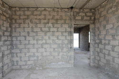 Construction of an individual residential building, room wall view with a doorway