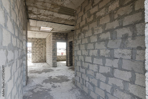 Construction of an individual residential building, a corridor from the front door to the rooms
