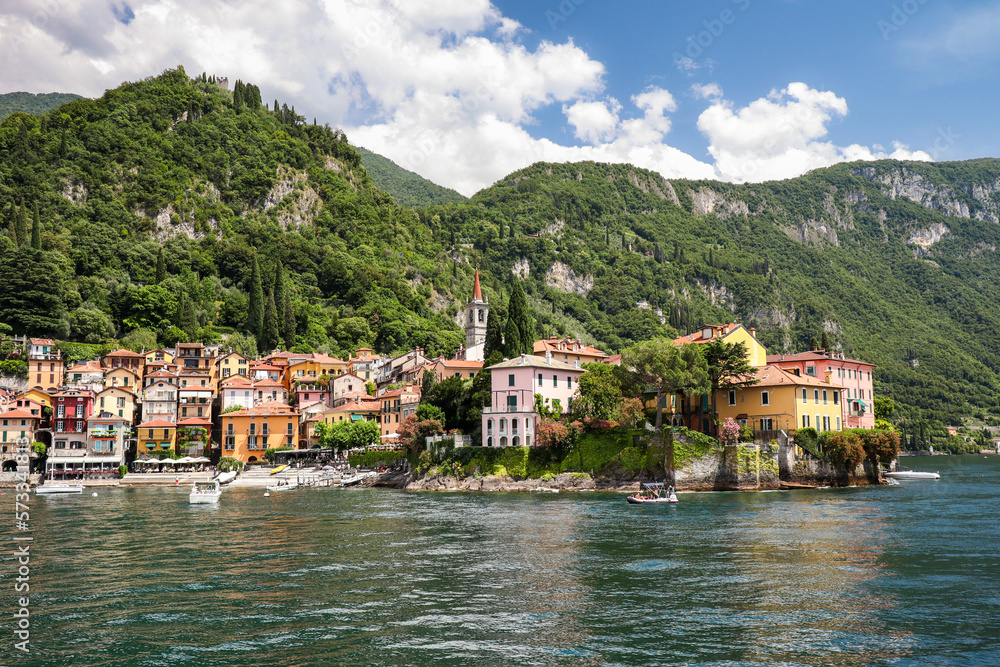 Lake Como Village with Green Mountains in Italy. Beautiful Scenery of Varenna Town with Colorful Architecture in Lombardy.
