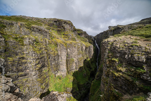 landscape in the mountains with glymur waterfall iceland