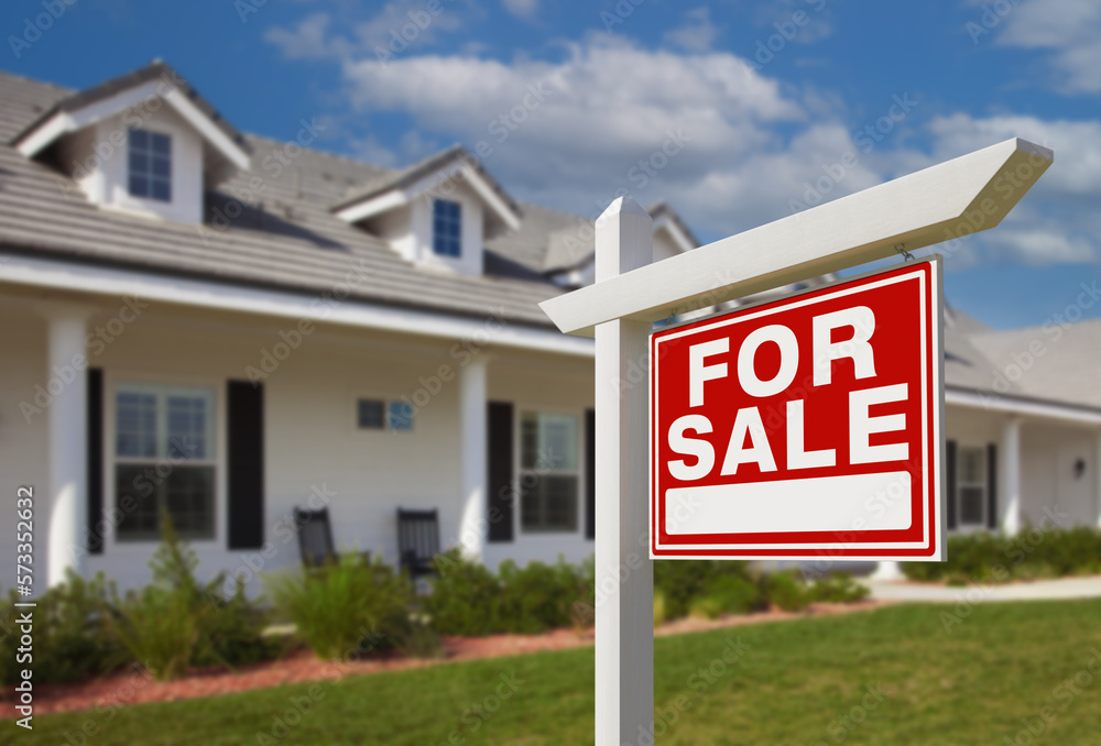 For Sale Real Estate Sign in Front of New House. For Sale Real Estate Sign in Front of New House.