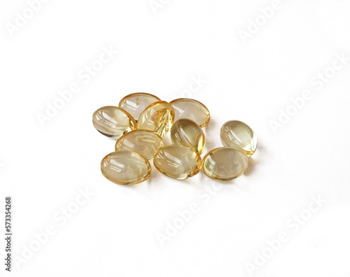Vitamin D. Omega 3 Supplement. Fish oil capsules isolated on white background. Pharmaceuticals pills medicine and healthcare concept. 