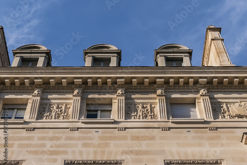 Architectural details of old buildings in Paris: The Criminal Court of Paris (Tribunal Correctionnel) located at the Palais de Justice at 14 Quai Goldsmiths. Paris. France. photo