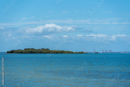 View across the water from Wellington Point to King Island, with Port of Brisbane on the horizon. Queensland, Australia 