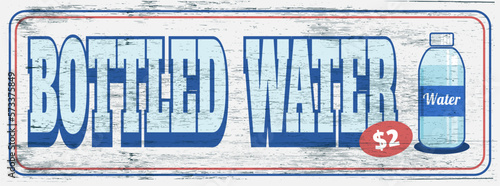 Bottled water 2 dollars sign on wood grain