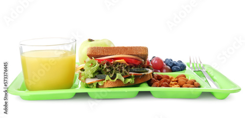 Tray with tasty food and juice on white background. School lunch