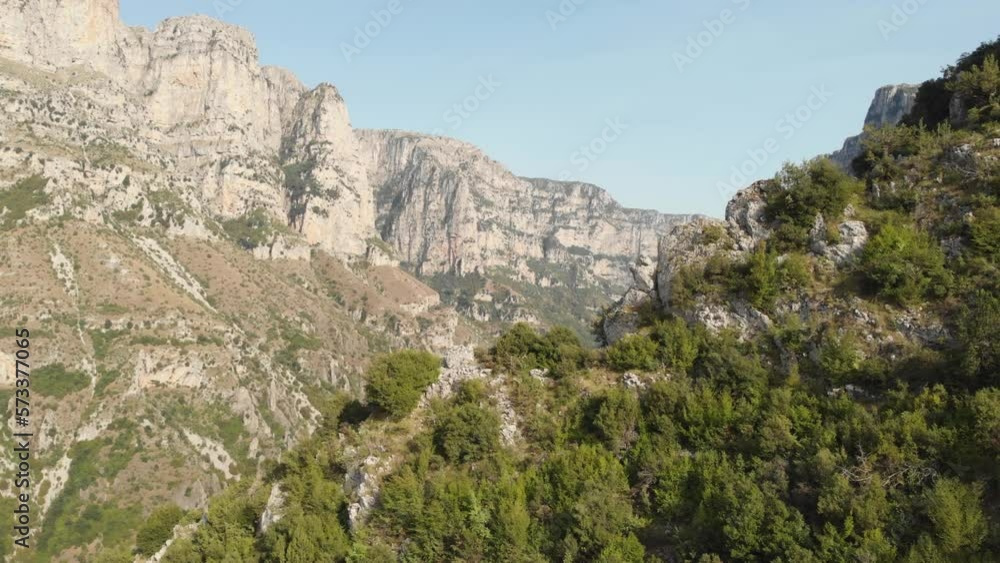 Drone Video revealing Flying Vikos Gorge Canyon summer day panning left Drone Video revealing Flying Vikos Gorge Canyon summer day panning left