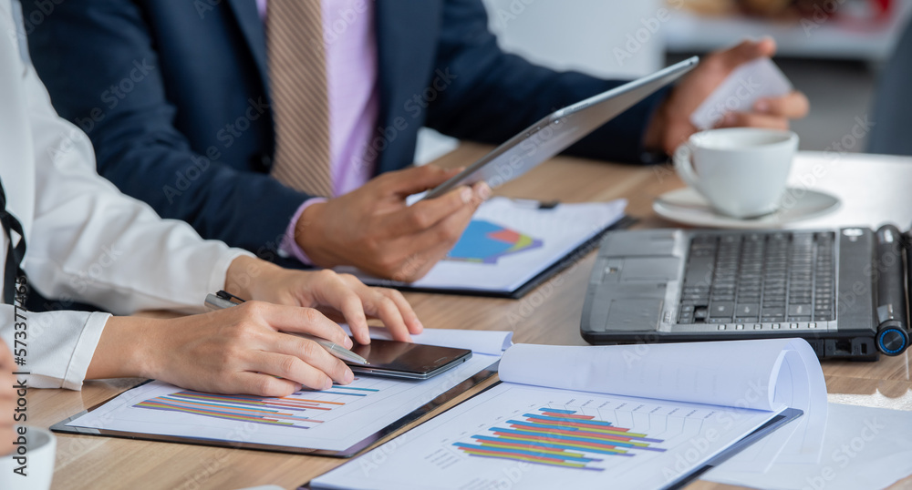 Fototapeta premium Banner of many data analyst statistics drawing graph analytics diagram work paper for explaining Business feasibility, profit sale