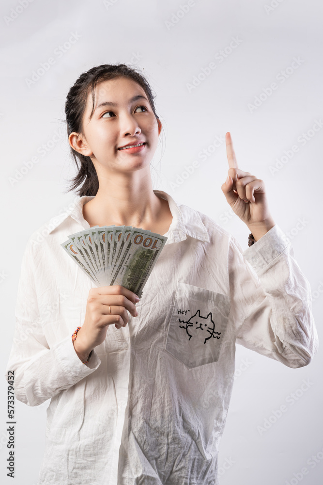 Business, finance and employment, entrepreneur and money concept. Successful young asian office manager, businesswoman showing earned cash, smiling satisfied as holding dollars Business, finance and employment, entrepreneur and money concept. Successful young asian office manager, businesswoman showing earned cash, smiling satisfied as holding dollars