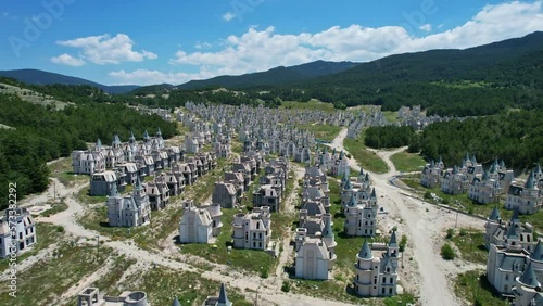 BOLU, TURKEY - JUNE, 2022: Aerial view of Burj Al Babas, development project of many french style mansions, now abandoned and frozen. photo